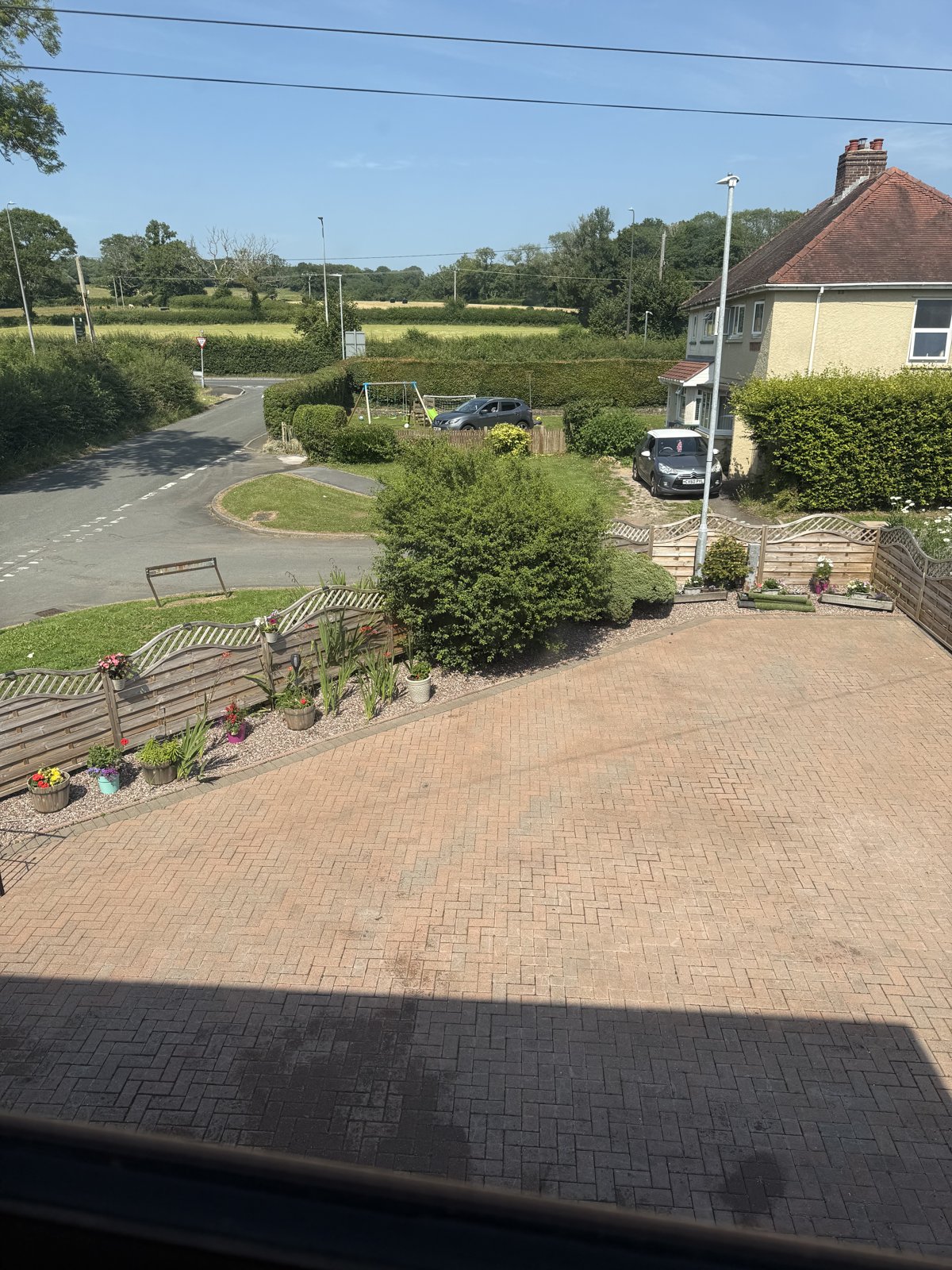 Block-paved driveway and entrance viewed from above