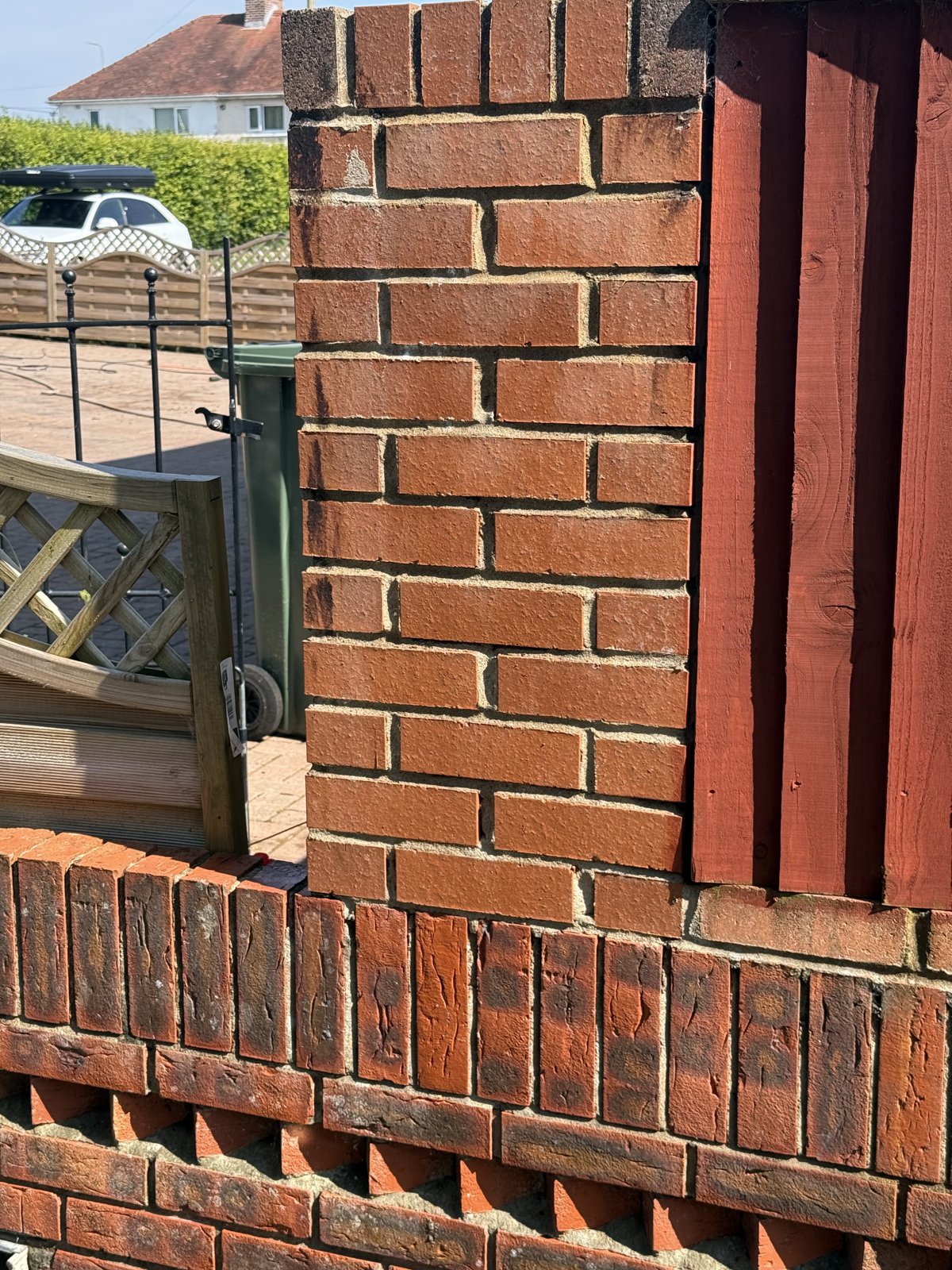 Close view of brick pillar and boundary wall